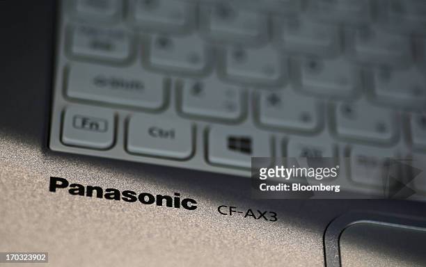 The Panasonic Corp. Logo is displayed on the company's Let's Note CF-AX3 laptop computer at the Panasonic plant in Kobe City, Hyogo Prefecture,...