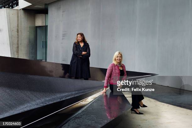 Architect Zaha Hadid and Nadja Swarovski pose with Hadid's sculpture 'Prima', an installation to mark the 20th anniversary of Vitra Fire Station, at...