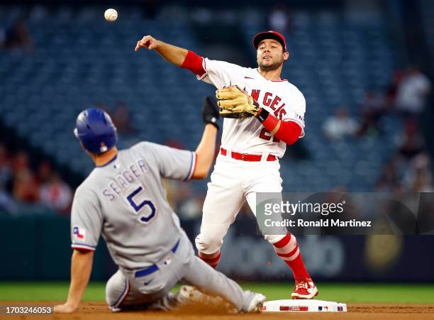 David Fletcher of the Los Angeles Angels makes the out against Corey Seager of the Texas Rangers in the first inning at Angel Stadium of Anaheim on...