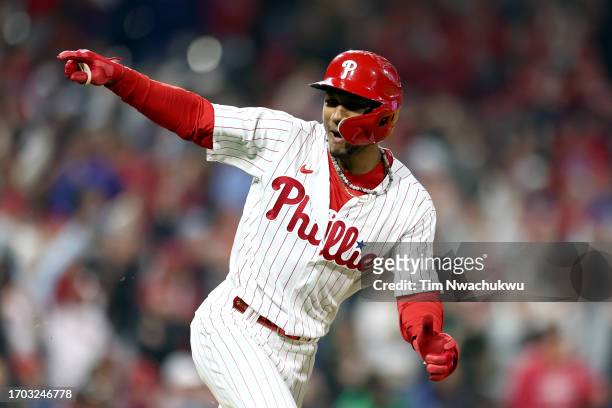 Johan Rojas of the Philadelphia Phillies reacts after hitting a walk-off single during the tenth inning to defeat the Pittsburgh Pirates at Citizens...