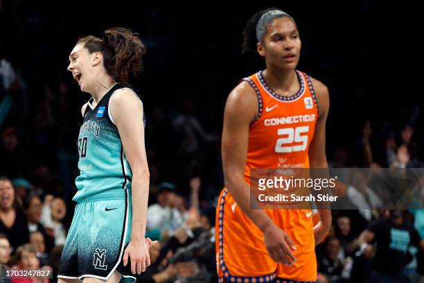 Breanna Stewart of the New York Liberty reacts as Alyssa Thomas of the Connecticut Sun looks on during the second half of Game Two of the 2023 WNBA...