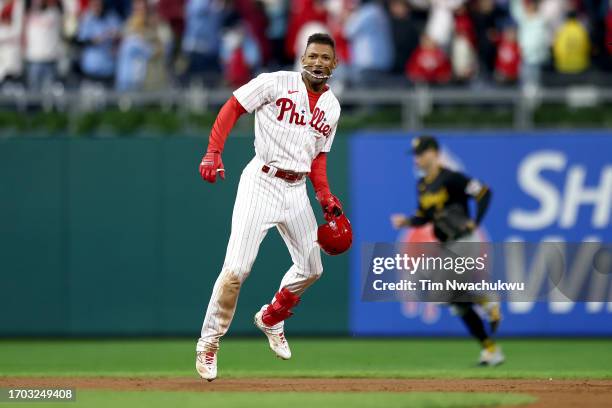 Johan Rojas of the Philadelphia Phillies reacts after hitting a walk-off single during the tenth inning to defeat the Pittsburgh Pirates at Citizens...