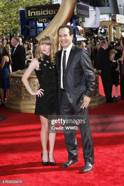 Sophie Shalhoub and Tony Shalhoub attend the 61st Primetime Emmy Awards at the NOKIA Theatre. Shalboub wears Hugo Boss.