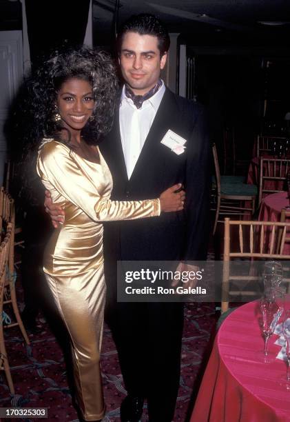 Singer Zelma Davis of C & C Music Factory and Khalid Khashoggi attend the Plaza Hotel's Rose Room Grand Opening Celebration on March 23, 1992 at the...