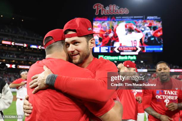 Trea Turner of the Philadelphia Phillies reacts with teammates after defeating the Pittsburgh Pirates at Citizens Bank Park on September 26, 2023 in...