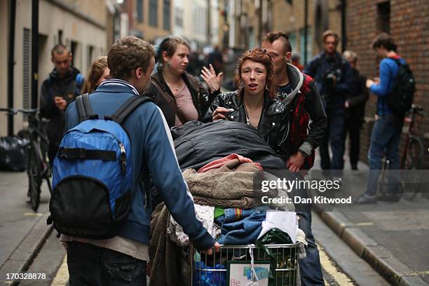 Activists are seen leaving the convergence centre of the Stop G8 protest group they occupied off Beak Street as after police detained some of the...