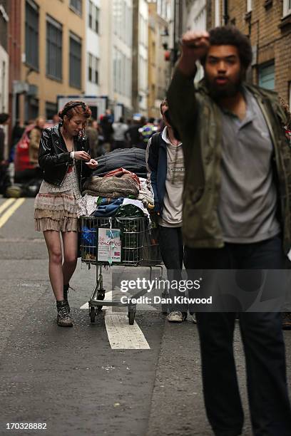 Activists are seen leaving the convergence centre of the Stop G8 protest group they occupied off Beak Street as after police detained some of the...