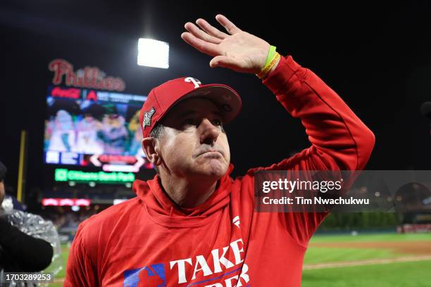 Rob Thomson of the Philadelphia Phillies reacts after defeating the Pittsburgh Pirates at Citizens Bank Park on September 26, 2023 in Philadelphia,...