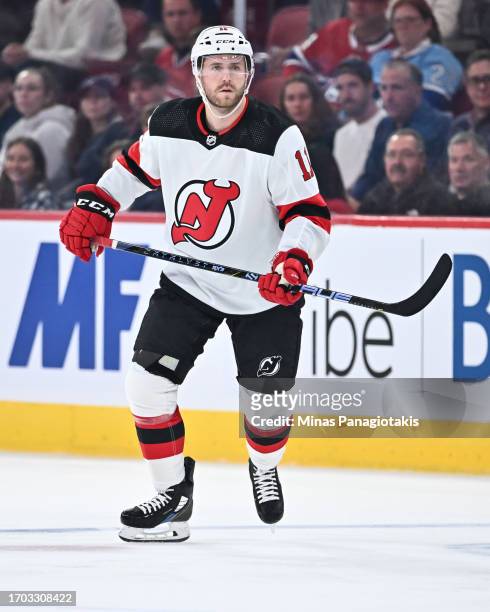 Chris Tierney of the New Jersey Devils skates during the first period against the Montreal Canadiens at the Bell Centre on September 25, 2023 in...
