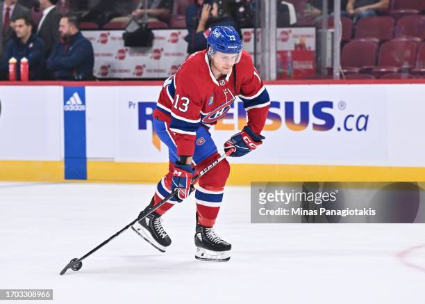 Mitchell Stephens of the Montreal Canadiens skates the puck during warm-ups prior to the game against the New Jersey Devils at the Bell Centre on...