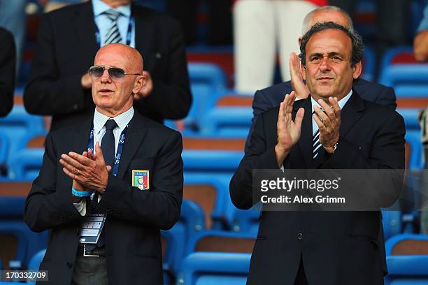 President Michel Platini and Arrigo Sacchi attend the UEFA European U21 Championship Group A match between Norway and Italy at Bloomfield Stadium on...
