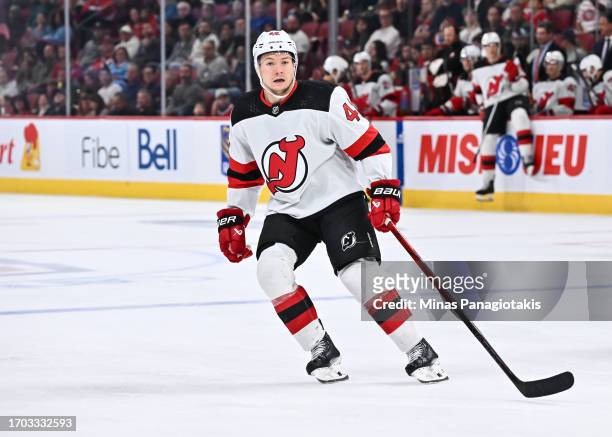 Curtis Lazar of the New Jersey Devils skates during the third period against the Montreal Canadiens at the Bell Centre on September 25, 2023 in...