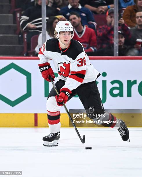 Topias Vilen of the New Jersey Devils skates the puck during the third period against the Montreal Canadiens at the Bell Centre on September 25, 2023...