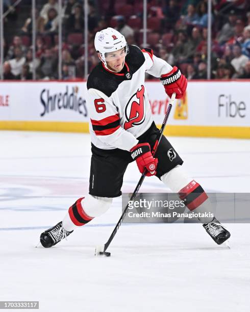 Colin Miller of the New Jersey Devils takes a shot during the third period against the Montreal Canadiens at the Bell Centre on September 25, 2023 in...