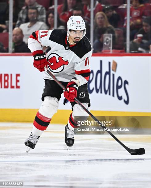 Jonas Siegenthaler of the New Jersey Devils skates the puck during the third period against the Montreal Canadiens at the Bell Centre on September...