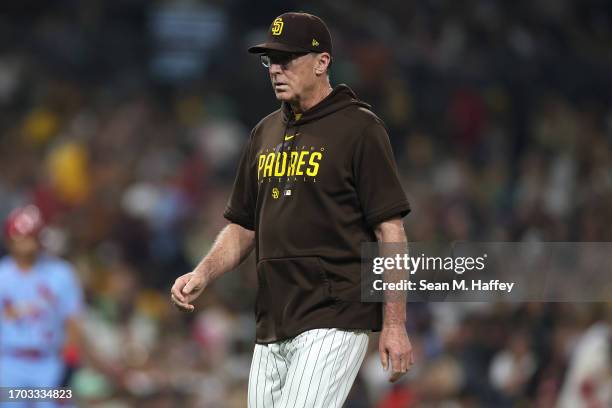 Manager Bob Melvin of the San Diego Padres returns to the dugout during a game against the St. Louis Cardinals at PETCO Park on September 23, 2023 in...