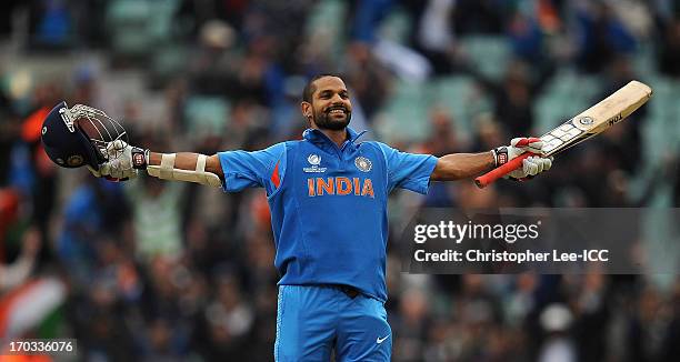 Shikhar Dhawan of Indian celebrates scoring his century during the ICC Champions Trophy Group B match between India and West Indies at The Oval on...