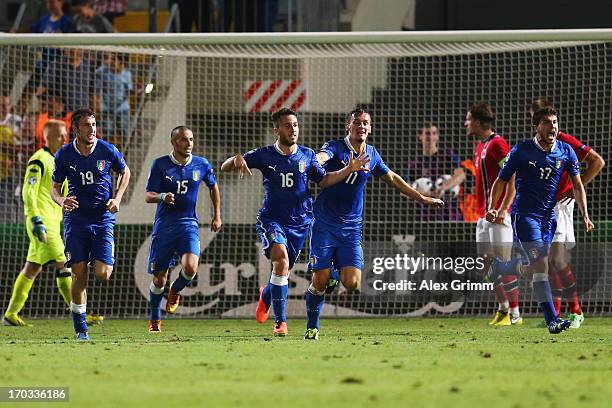 Andrea Bertolacci of Italy celebrates his team's first goal with team mates during the UEFA European U21 Championship Group A match between Norway...