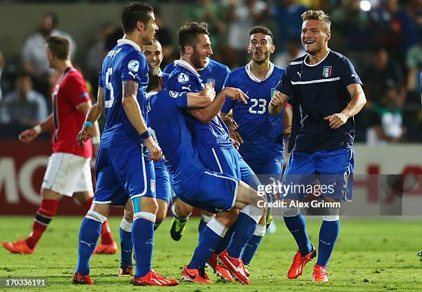 Andrea Bertolacci of Italy celebrates his team's first goal with team mates during the UEFA European U21 Championship Group A match between Norway...