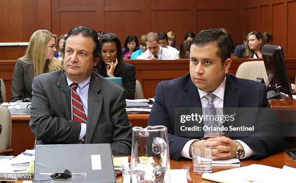 Jury consultant Robert Hirschhorn, left, sits with defendant George Zimmerman as they listen to Judge Debra Nelson at Seminole circuit court on the...