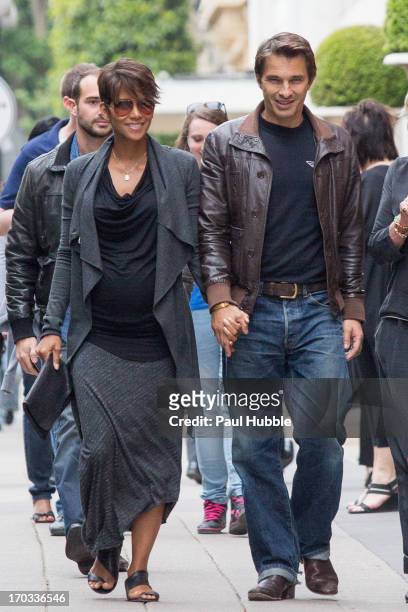 Actress Halle Berry and actor Olivier Martinez are seen strolling on the 'Avenue Montaigne' on June 11, 2013 in Paris, France.