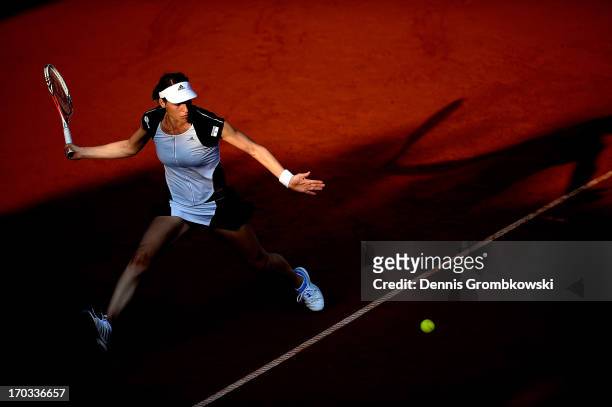 Andrea Petkovic of Germany plays a forehand in her first round match against Sofia Arvidsson of Sweden during day four of the Nuernberger Insurance...