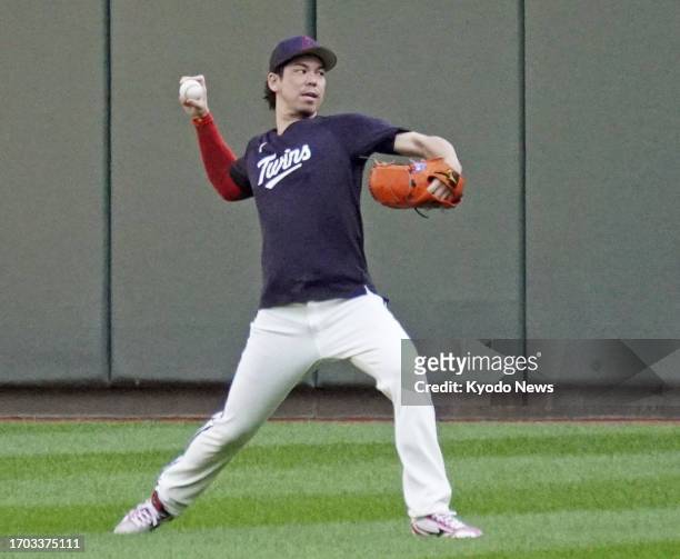 Minnesota Twins pitcher Kenta Maeda plays catch at Target Field in Minneapolis, Minnesota, on Oct. 2 ahead of an American League Wild Card Series...