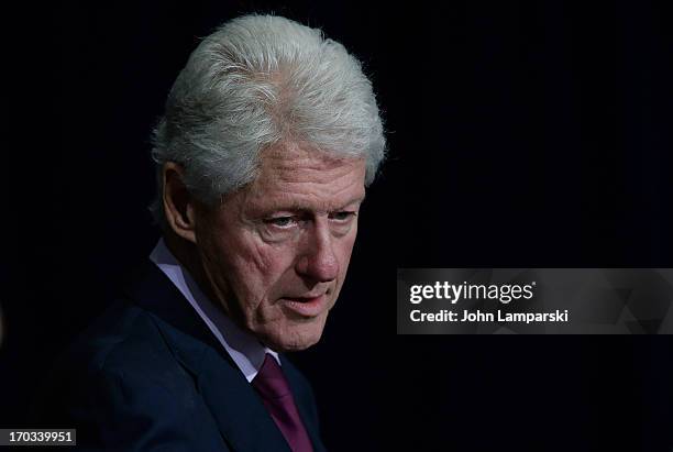 Former President of the United States Bill Clinton attends the 72nd Annual Father Of The Year Awards at the Grand Hyatt New York on June 11, 2013 in...