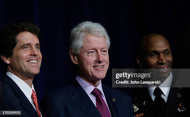 Mark K. Shirver, Former President of the United States Bill Clinton and Major Jackson Drumgoole attend the 72nd Annual Father Of The Year Awards at...