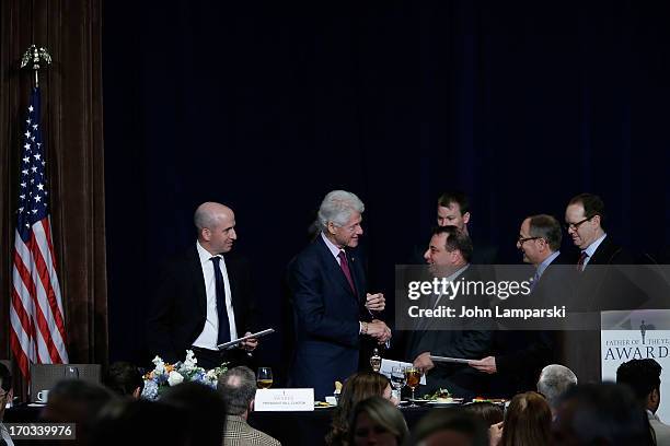 Former President of the United States Bill Clinton attends>> the 72nd Annual Father Of The Year Awards at the Grand Hyatt New York on June 11, 2013...