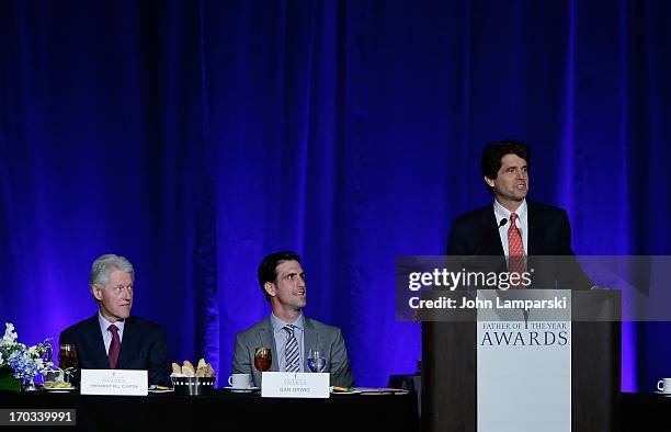 Former President of the United States Bill Clinton , Dan Orwig and Mark K. Shirver attend the 72nd Annual Father Of The Year Awards at the Grand...