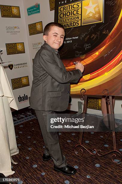 Atticus Shaffer attends Critics' Choice Television Awards VIP Lounge on June 10, 2013 in Los Angeles, California.