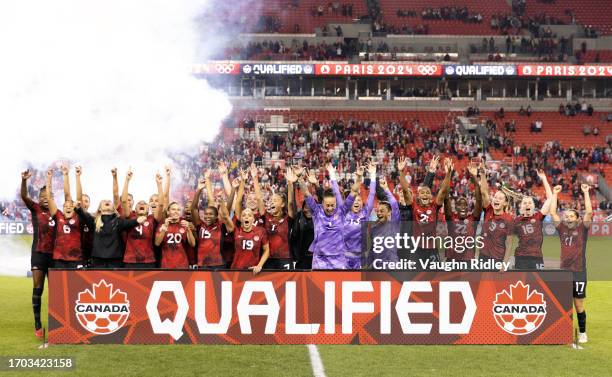 Canada celebrate a win against Jamaica during a Paris 2024 Olympic Games Qualifier match at BMO Field on September 26, 2023 in Toronto, Ontario,...