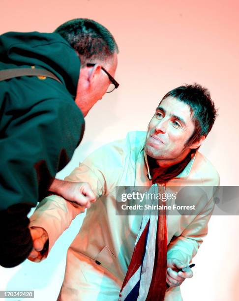 Liam Gallagher of Beady Eye meets fans at an in-store appearance at HMV on June 11, 2013 in Manchester, England.