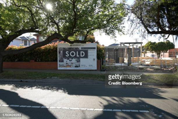 Sold"sticker covers a sale sign on a residential property in the suburb of Mulgrave in Melbourne, Australia, on Monday, Oct. 2, 2023. Australian home...