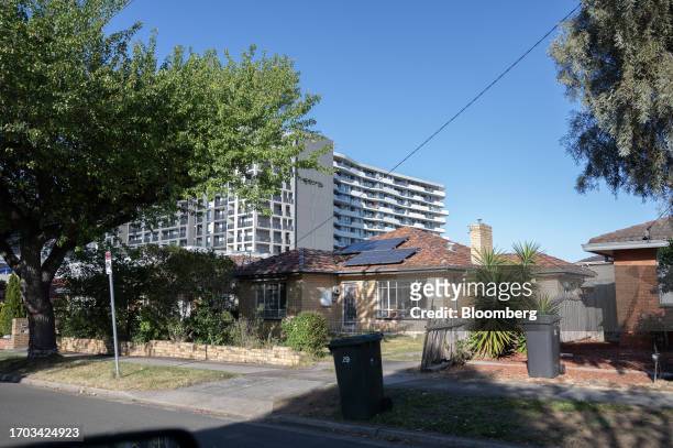 Residential apartments behind brick houses in the suburb of Mulgrave in Melbourne, Australia, on Monday, Oct. 2, 2023. Australian home prices stayed...