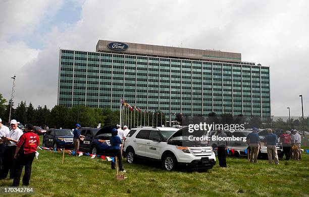 Judges assess the repairs made on Ford Motor Co. Explorers by students from across the nation at the National Finals of the Annual Ford/AAA Student...