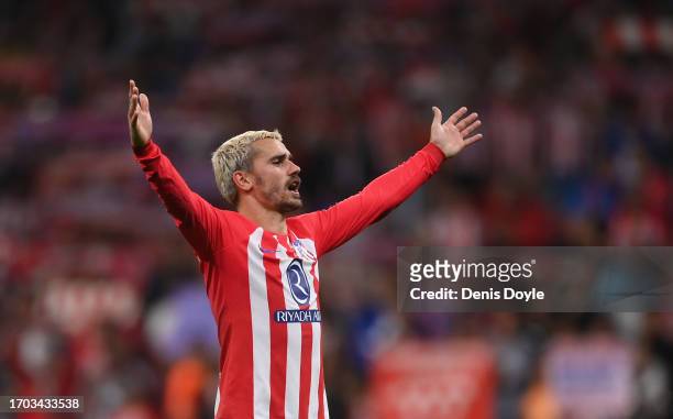 Antoine Griezmann of Atletico de Madrid celebrates after the team's victory during the LaLiga EA Sports match between Atletico Madrid and Real Madrid...