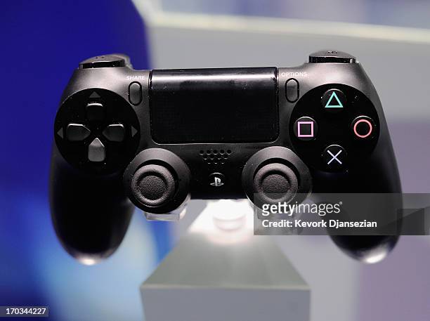Playstation 4 and its controller is on display at the Sony Playstation E3 2013 booth at the Los Angeles Convention Center on June 11, 2013 in Los...
