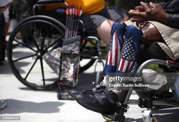 Disabled veteran with prosthetic legs looks on during the archery competition at the inaugural Valor Games Far West on June 11, 2013 in Foster City,...