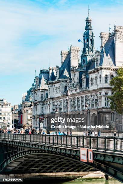 hotel de ville with pont d'arcole, paris, france - the marais stock pictures, royalty-free photos & images