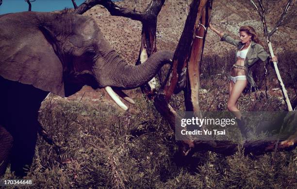 Model Cameron Russell is photographed for swimsuit company Beach Bunny on September 10, 2010 in Los Angeles, California. PUBLISHED IMAGE.