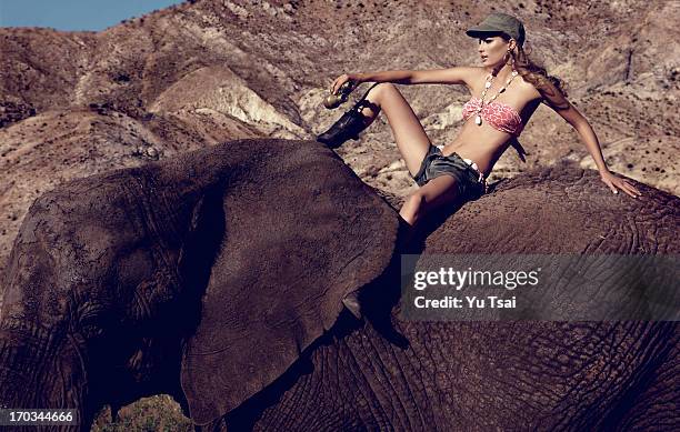 Model Cameron Russell is photographed for swimsuit company Beach Bunny on September 10, 2010 in Los Angeles, California. PUBLISHED IMAGE.