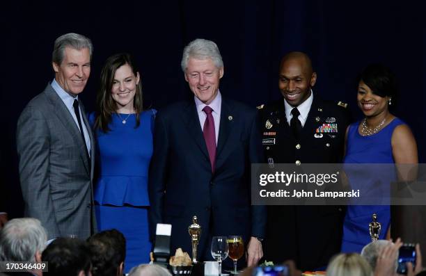Terry J. Lundgren, Tracy Lundgren, Former President of the United States Bill Clinton and Major Jackson Drumgoole ll and Mrs. Drumgoole attend the...