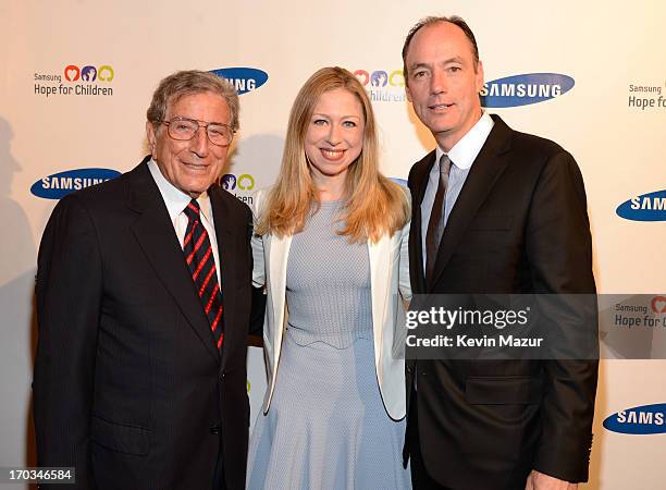 Tony Bennett, Chelsea Clinton and President of Samsung Electronics America Tim Baxter attend the Samsung's Annual Hope for Children Gala at...