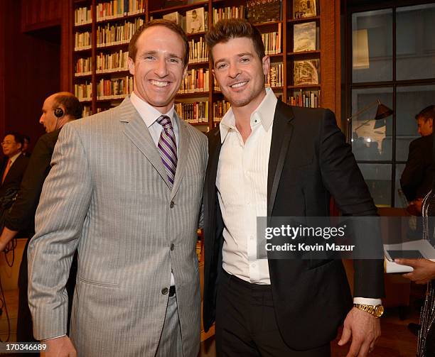 Drew Brees and Robin Thicke attend the Samsung's Annual Hope for Children Gala at CiprianiÕs in Wall Street on June 11, 2013 in New York City.
