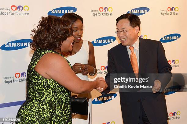 Sherri Shepard, Estelle and CEO of Samsung Electronics America YK Kim attend the Samsung's Annual Hope for Children Gala at CiprianiÕs in Wall Street...
