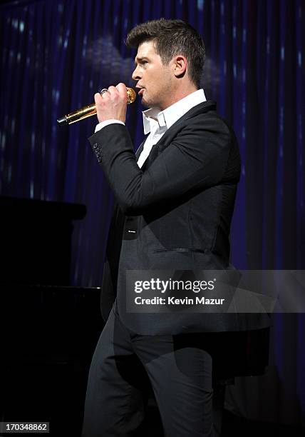 Robin Thicke performs on stage during the Samsung's Annual Hope for Children Gala at CiprianiÕs in Wall Street on June 11, 2013 in New York City.