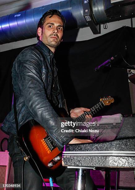 Dean Fertita of Queens of the Stone Age performs at Rough Trade East on June 11, 2013 in London, England.