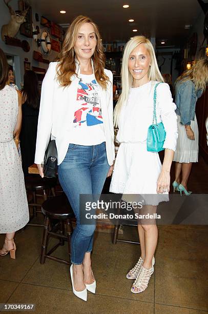 Jacqui Getty and designer Alexandra Von Furstenberg attend the Paper Denim & Cloth and Baby2Baby Luncheon at Son Of A Gun on June 11, 2013 in Los...